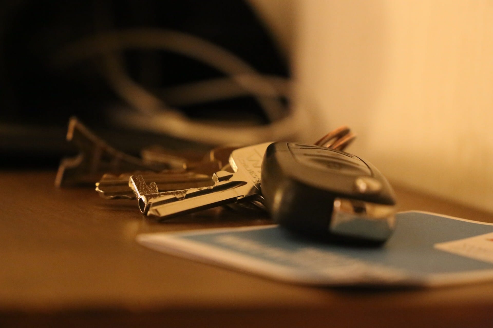 On desk are Car Key FOB programmed by The LockSmith Co.