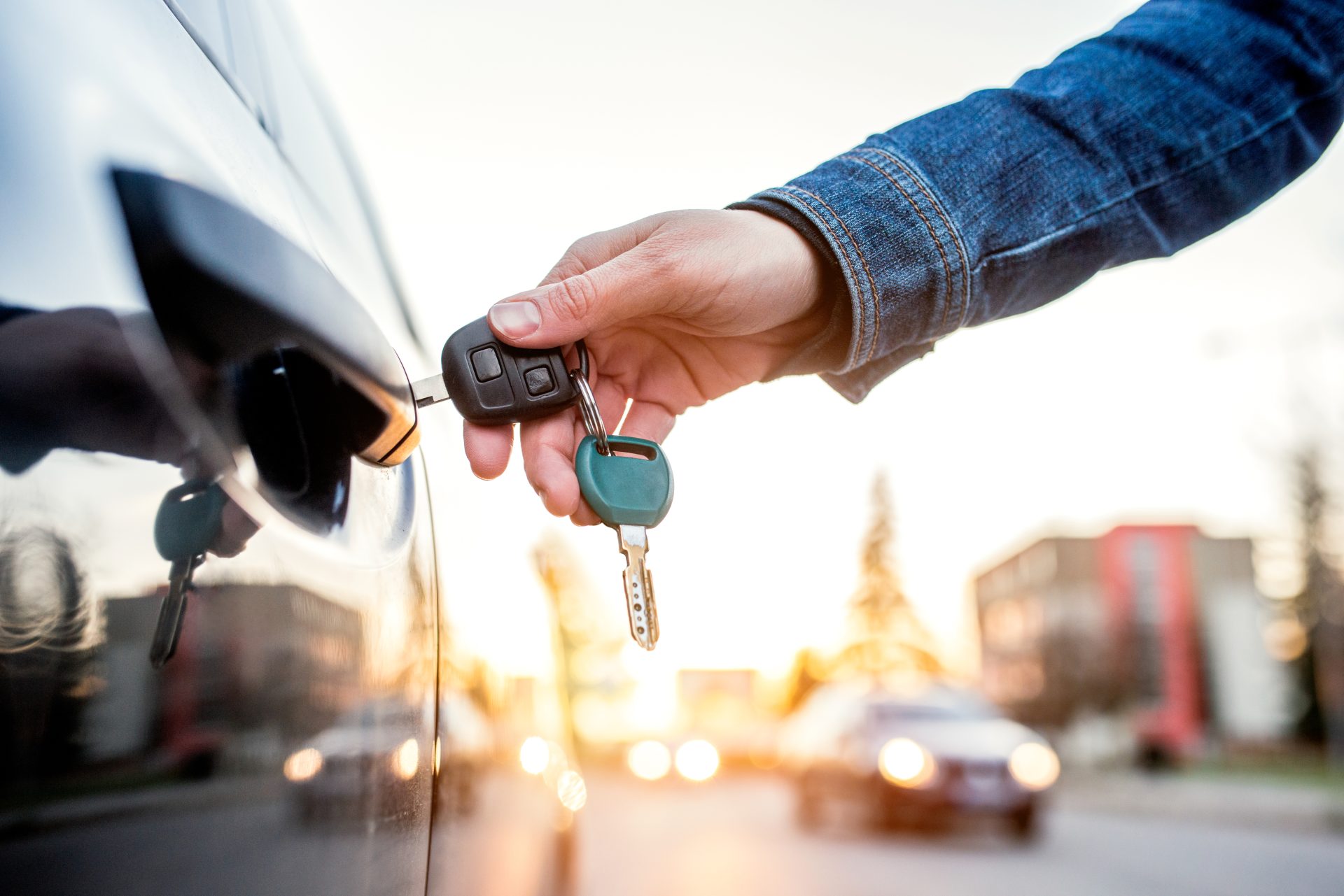 woman with car key 2021 08 26 12 08 26 utc - The LockSmith Co.